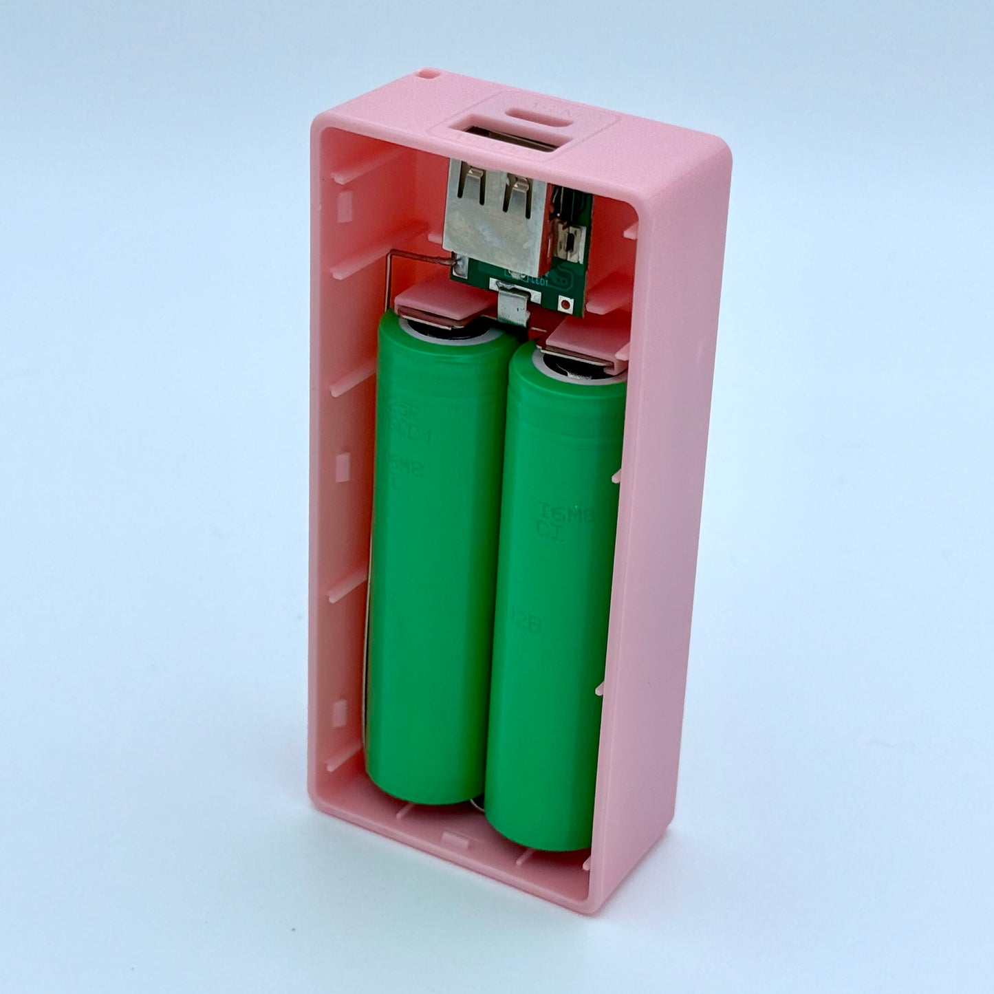 Portable Power Bank 5600mAh – Dual 18650 USB Charger with Keychain | Multiple Colors, Ready to Use